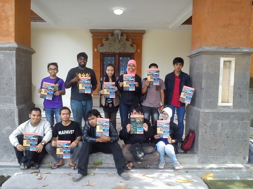 Vet students with the "Life Behind Bars" posters that they distributed in Bali. 
